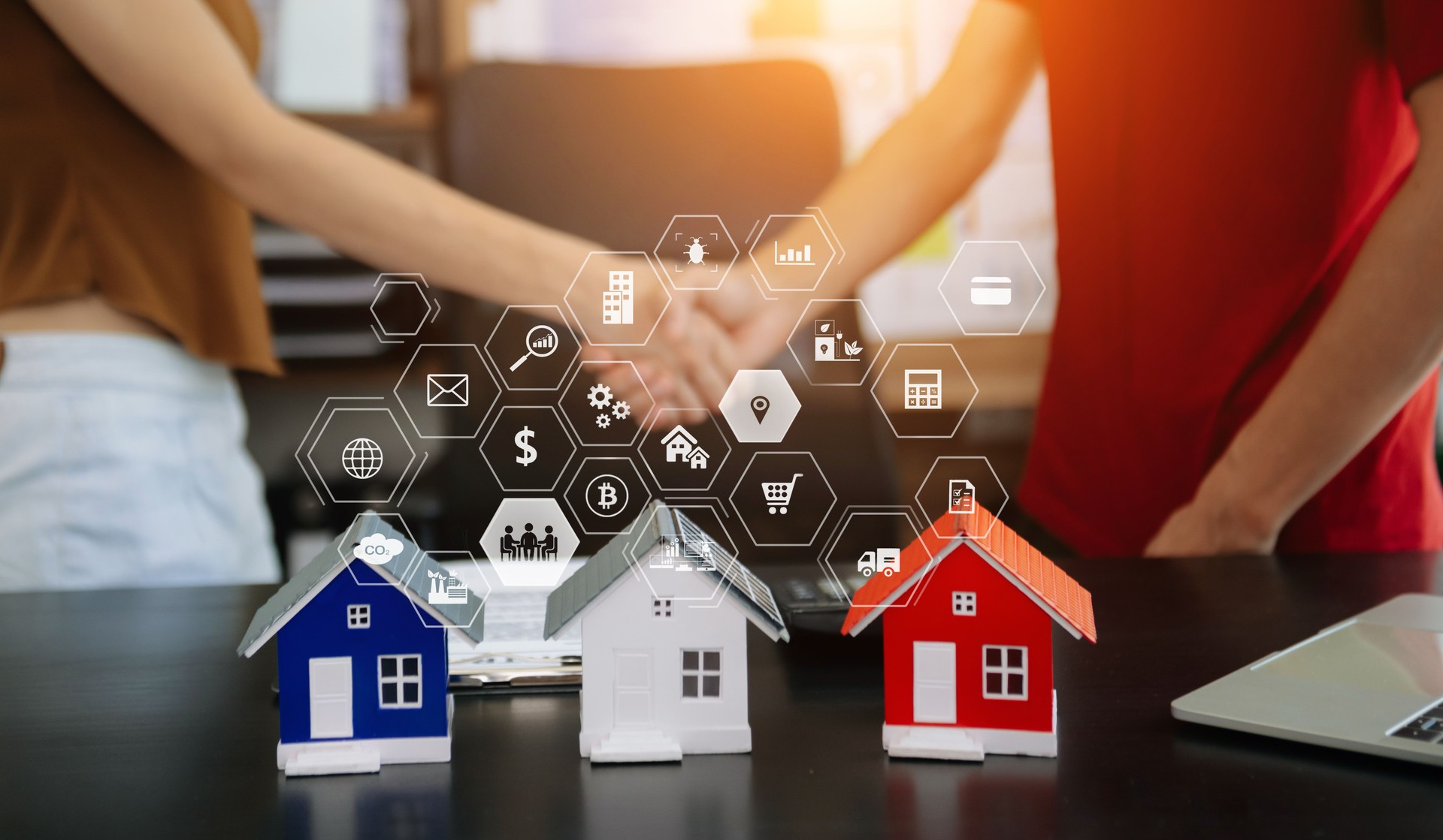 balancing the property sector The real estate agent is explaining the house style to see the house design and the purchase agreement.Wooden house at office